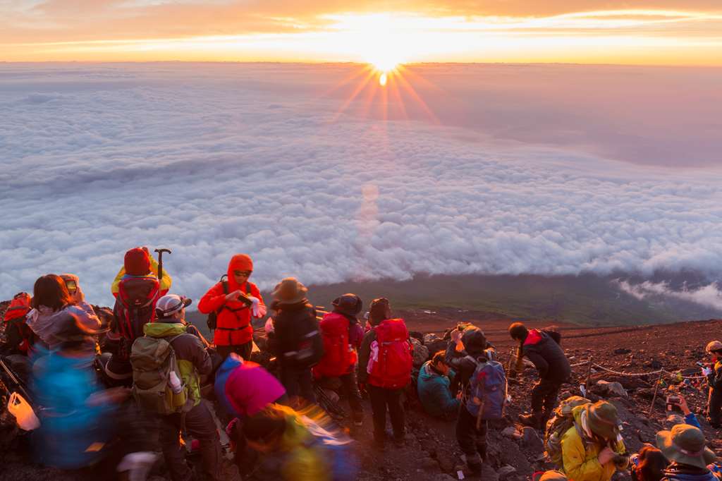 Sunrise over a sea of ​​clouds at the top of Mount Fuji, Japan